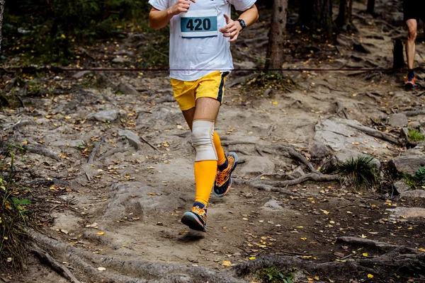 Man running mountain marathon