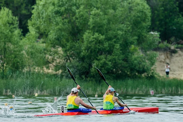 Two athlete in a kayak