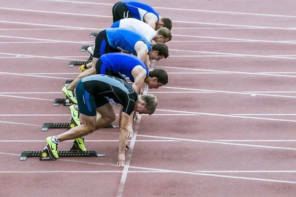 Sprinters on the start line 100 m