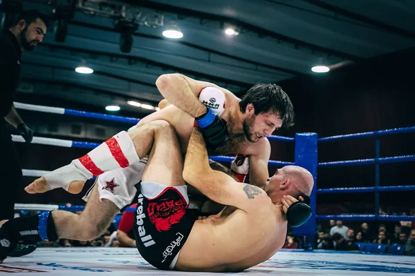 Ground fighting is of two athletes of mixed martial arts