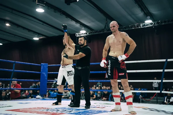 Referee announces victory of MMA fighter