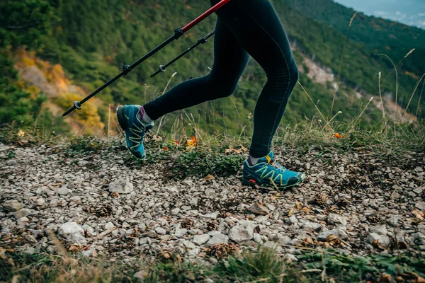 Girl hiking  in mountains