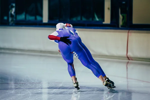 Men athletes skater simultaneously roll