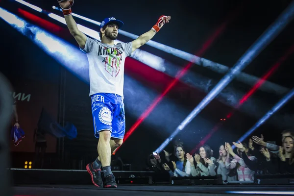 Athlete mixed martial arts fighter during presentation before fight welcomes their fans