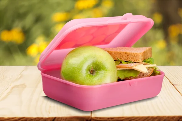 Lunchbox with an apple isolated
