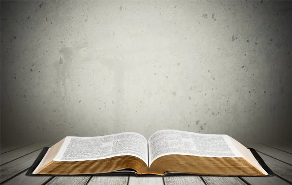 Open book on  wooden table