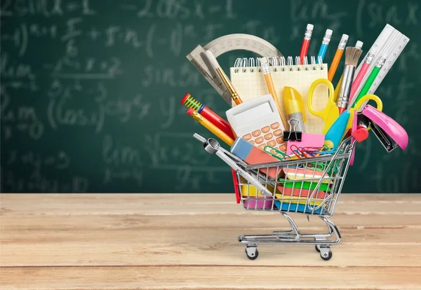 Stationery objects in mini supermarket cart