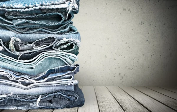 Stack of jeans clothes