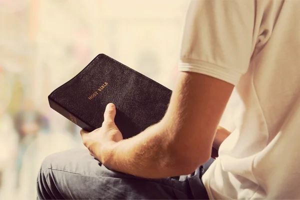Man reading  Bible book