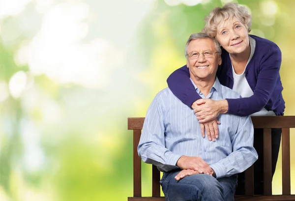 Happy senior couple smiling