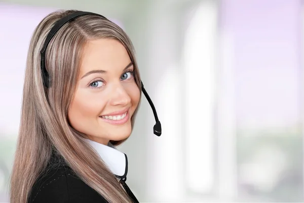 Young woman face with headphones