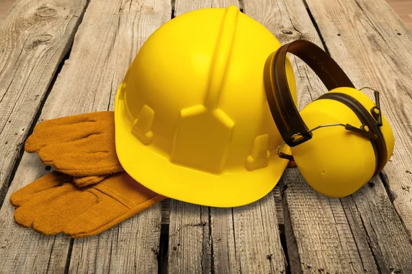 Yellow hard hat and  gloves