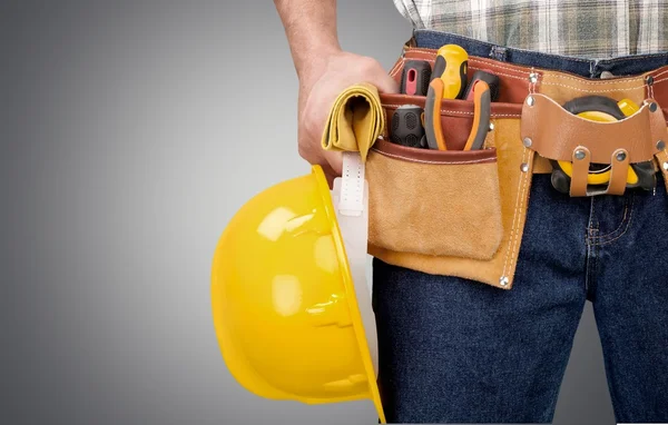 Worker with a tool belt