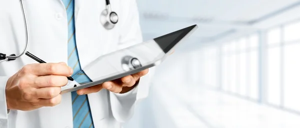 Doctor working with tablet pc