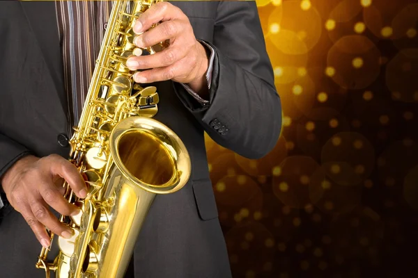 Man playing on saxophone