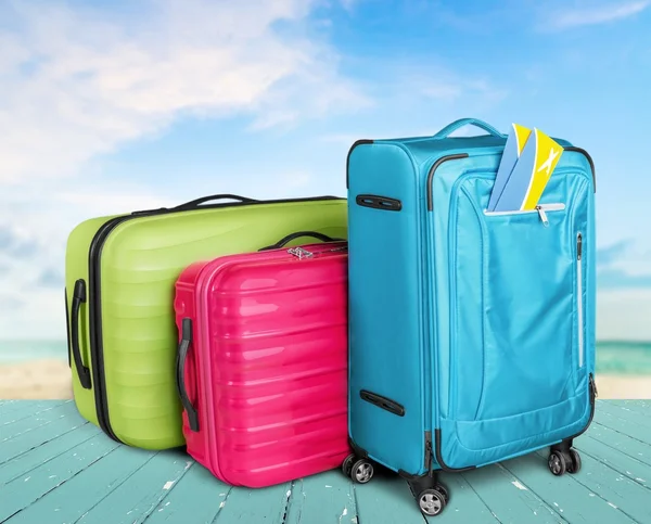 Large suitcases on background