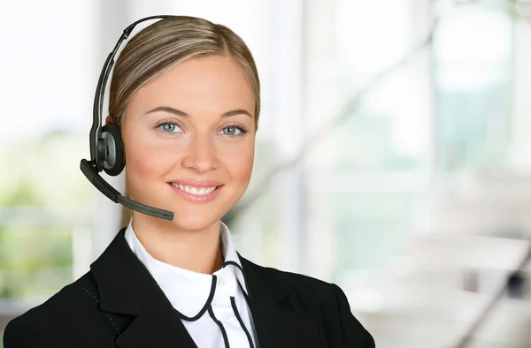 Young woman face with headphones