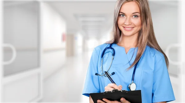 Female doctor with stethoscope isolated
