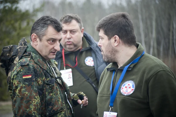 Volunteers decide how to move a damaged bridge on the way to Sievierodonetsk