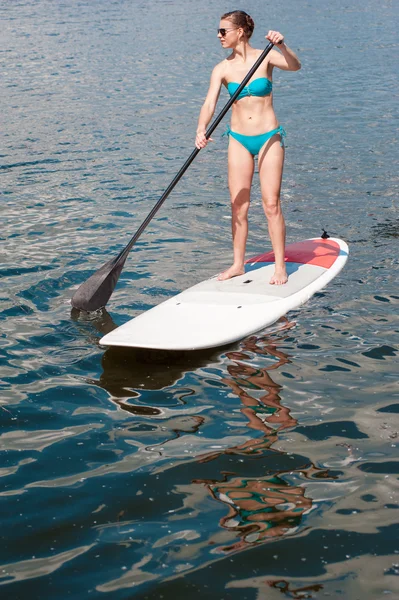 SUP Stand up paddle board woman paddle boarding11