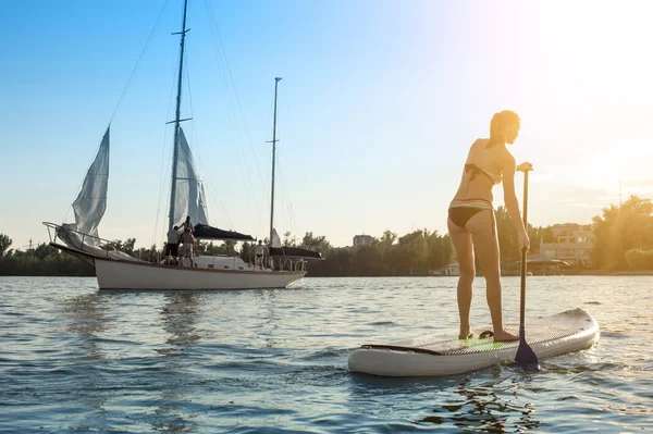SUP Stand up paddle board woman paddle boarding13