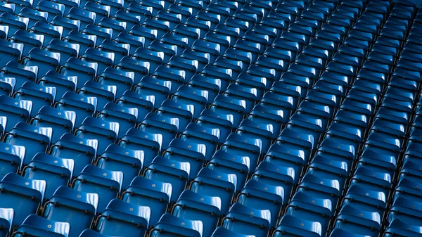 Background of empty blue stadium seats
