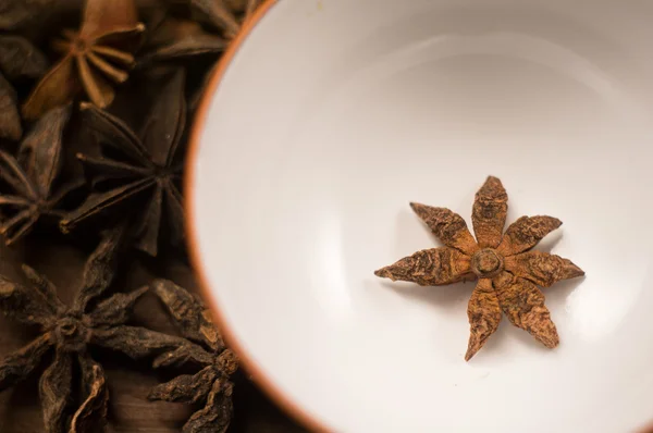 Spices. Anise stars photo. Intentionally blurred lens focus effect.