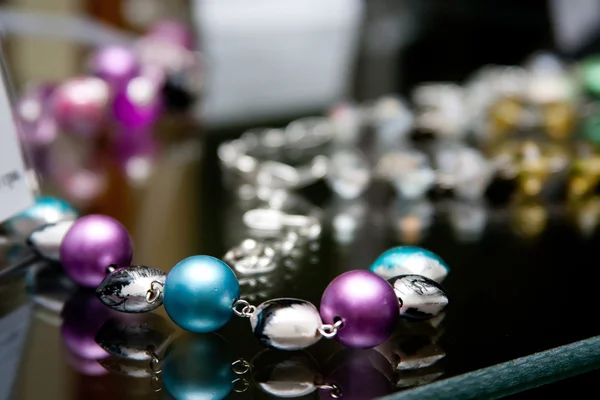 Handmade jewelry and keychains with colorful glass beads