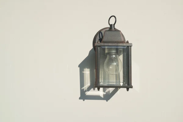 Outdoor lamp on the white wall