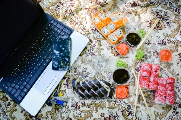 Picnic. Sushi outdoors on a summer day