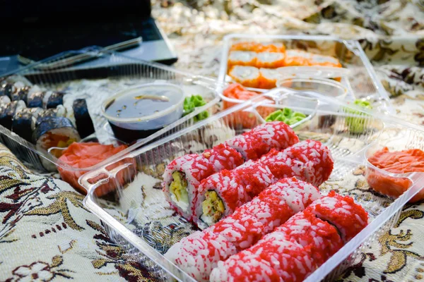 Picnic. Sushi outdoors on a summer day