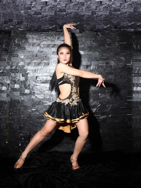 Beautiful Asian woman Latin dance