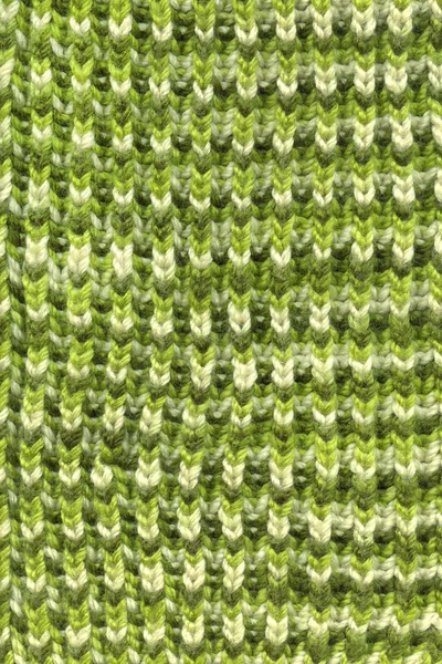 Knitted natural wool texture background. Knitted scarf element