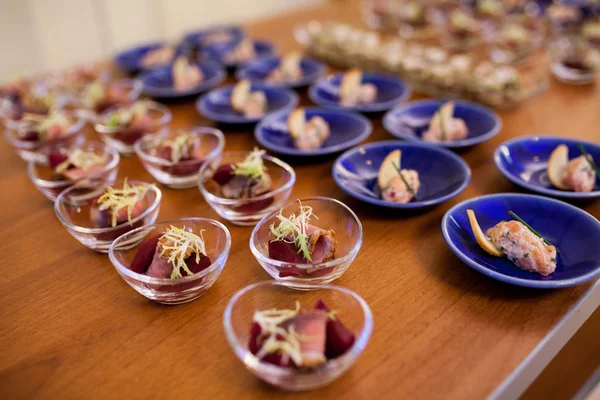 Catering services background with snacks on guests table in rest