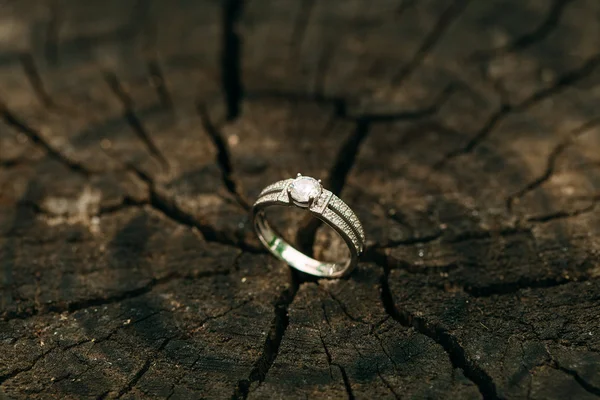 Wedding Rings on wooden old background