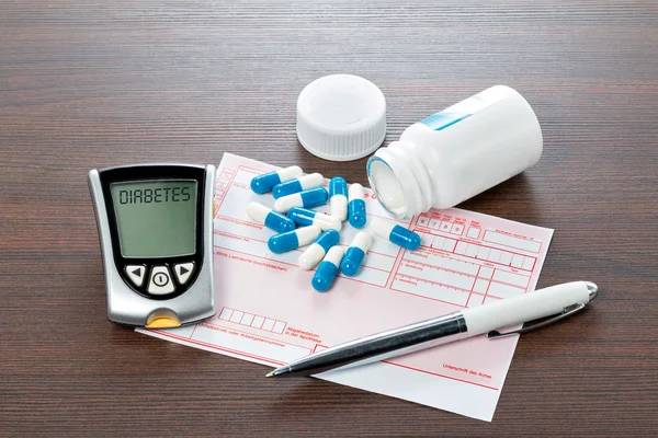 Glucose meter and recipe on the doctors desk