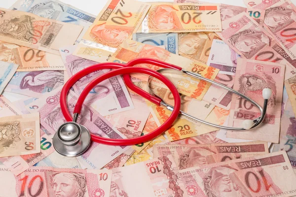 Real (Reais) bills with stethoscope