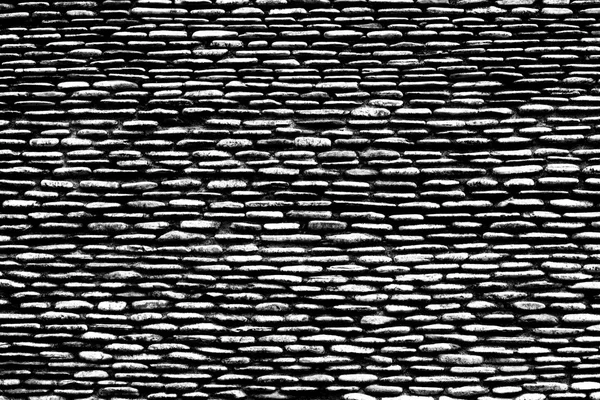 Texture background of the stones wall, black and white.