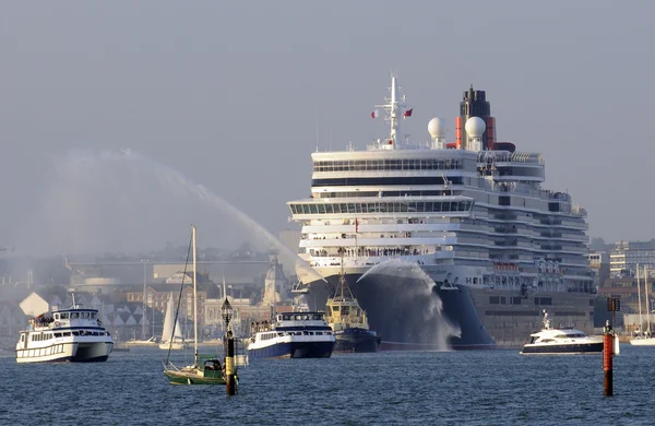 Queen Elizabeth departs Southampton port England UK