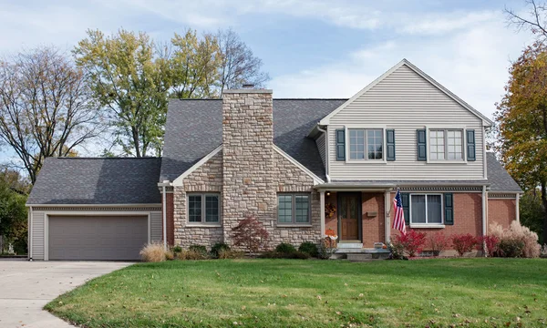 House with Large Stone Fireplace Chimney