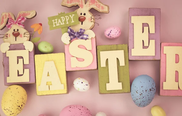 Easter decoration with easter wooden letters and eggs.