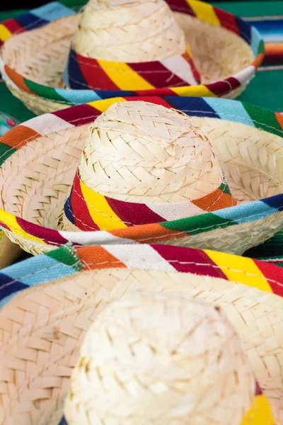 Mexican fiesta table decoration with colorful fiesta sombreros.