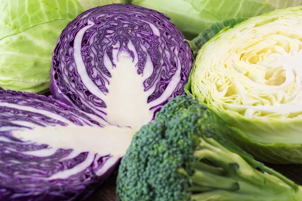 Fresh, organic cut green and purple cabbage.
