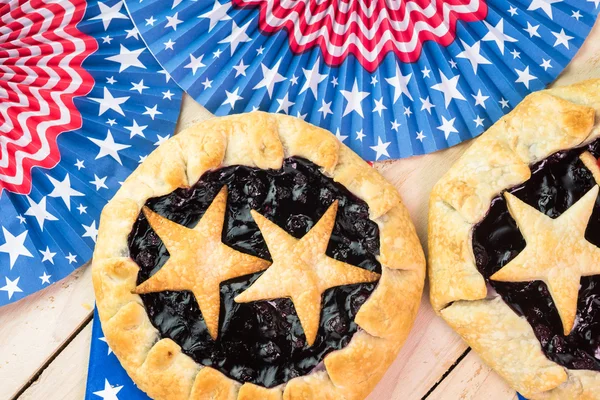 Fresh homemade blueberry pies, decorated with stars for Forth of