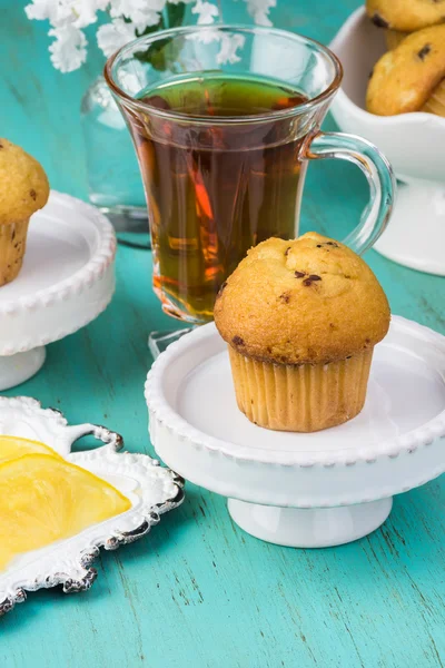 Mini chocolate chips muffins and cup of tea.
