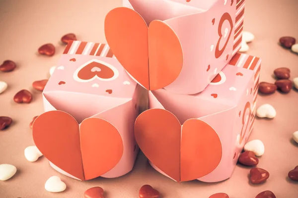 Colorful Valentines Day heart shaped candies in the boxes.