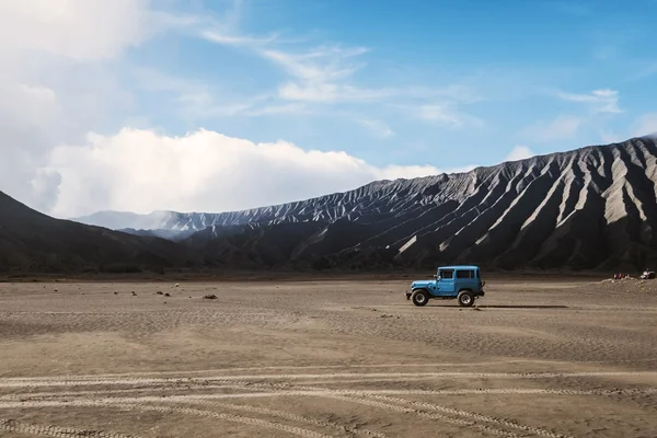 Landscape of national parks, Mount Bromo volcano, with blue adventure off road