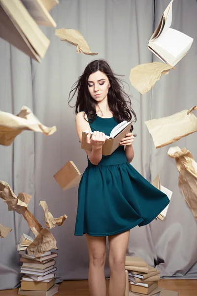 Art portrait of beautiful woman reading book