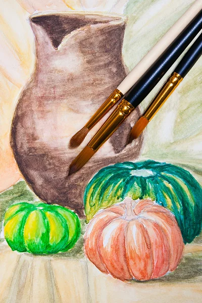 Paint brushes with watercolors painting.