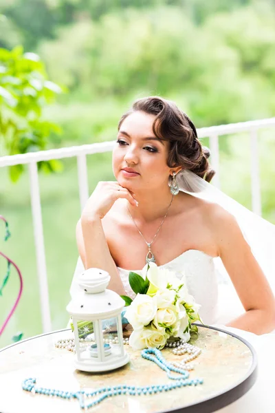 Beautiful gorgeous  bride  on the restaurant terrace